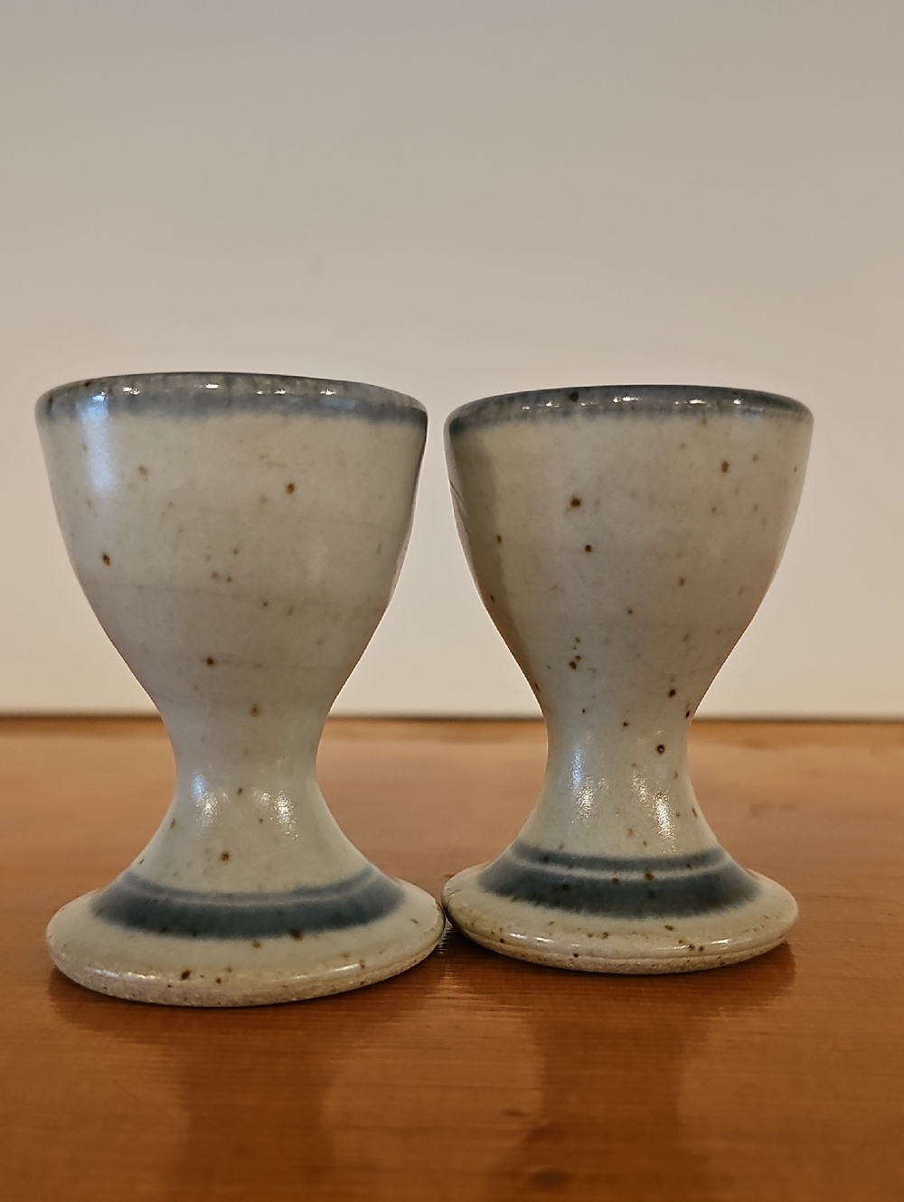 Speckled Ceramic Egg Cups in Cream with Blue Rim - Set of 2